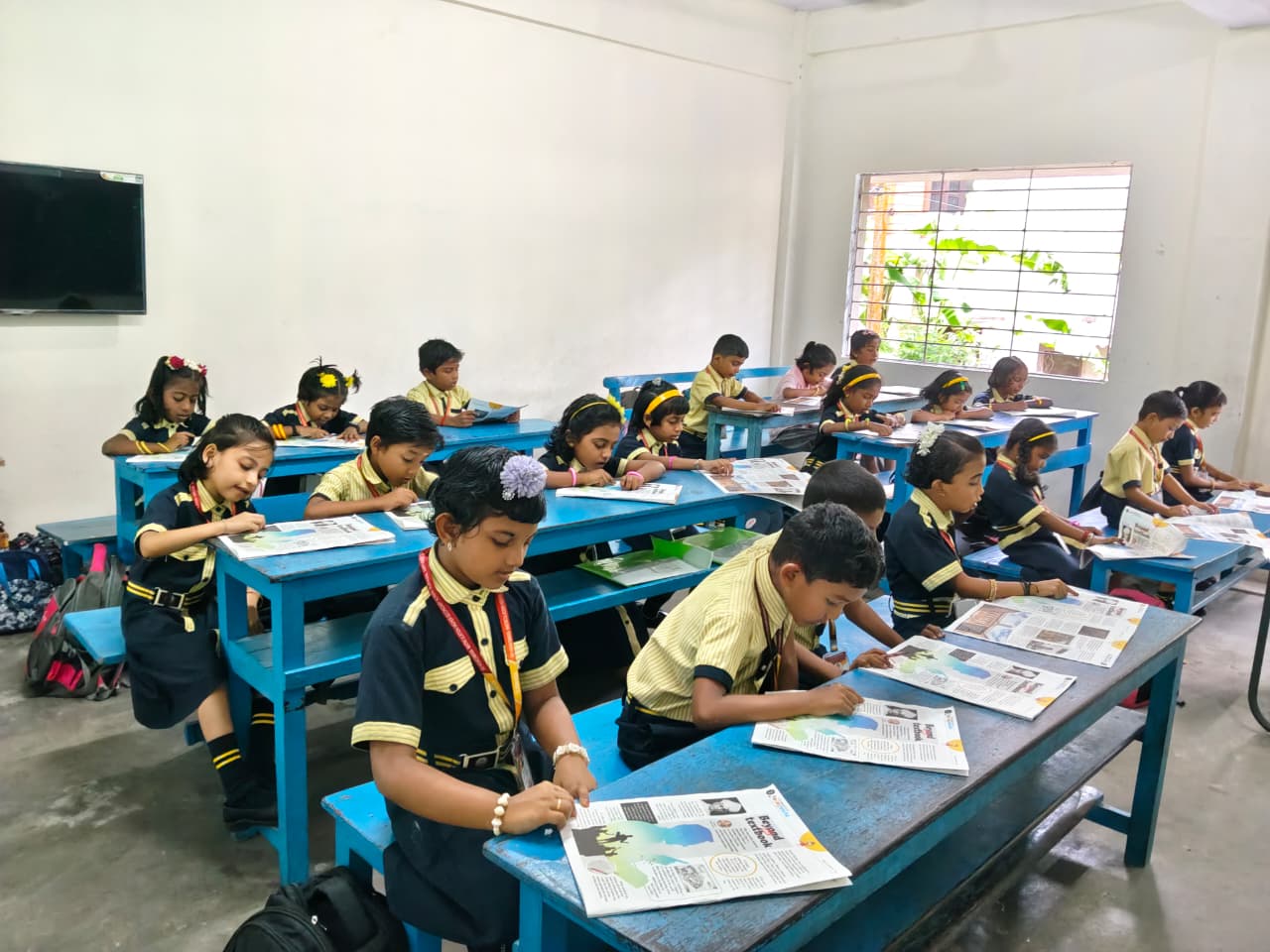Students reading and learning in the library
