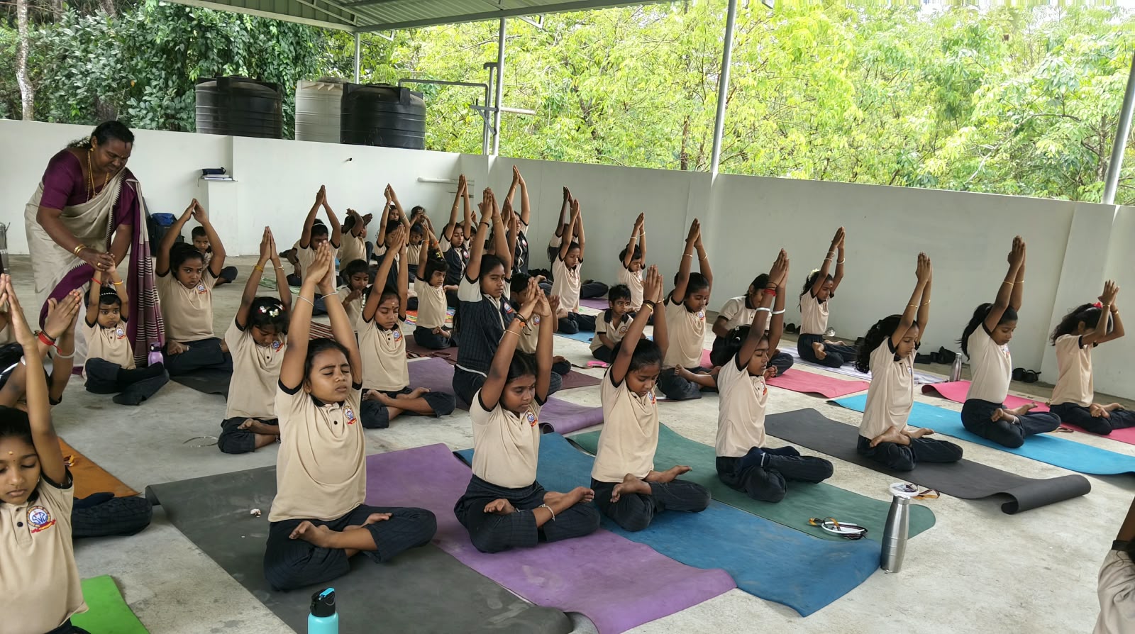 Students practising yoga